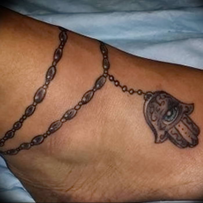 Photo of an example of a drawing of a tattoo with an amulet 01.09.2018 №031 - tattoovalue.net
