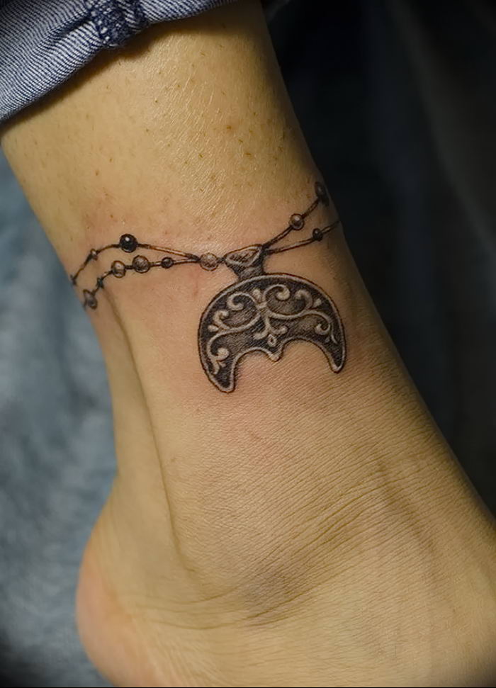 Photo of an example of a drawing of a tattoo with an amulet 01.09.2018 №196 - tattoovalue.net