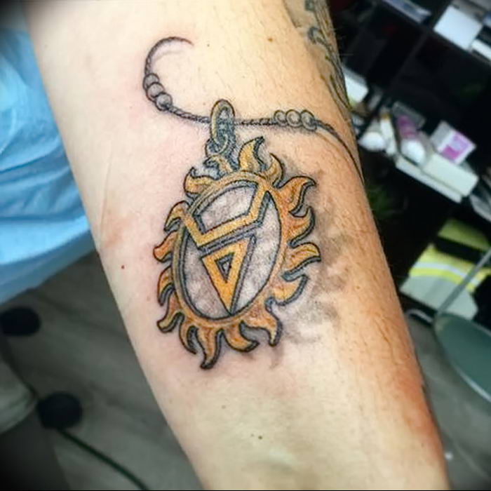 Photo of an example of a drawing of a tattoo with an amulet 01.09.2018 №223 - tattoovalue.net