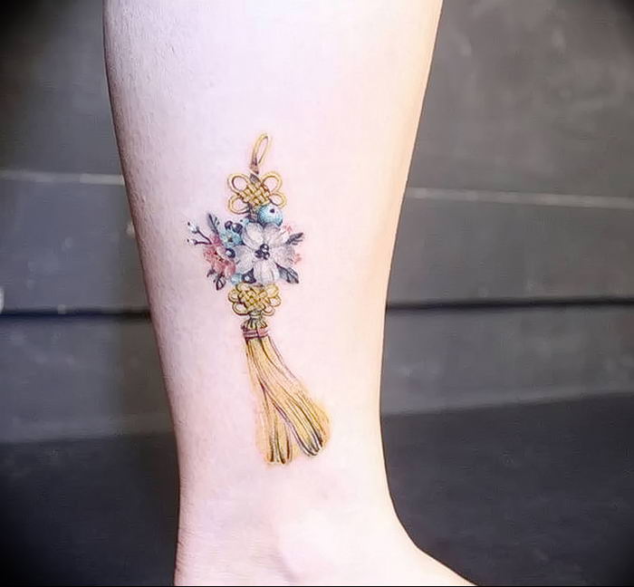 Photo of an example of a drawing of a tattoo with an amulet 01.09.2018 №246 - tattoovalue.net