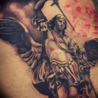 The significance of tattoo Archangel Michael: history, photo drawings