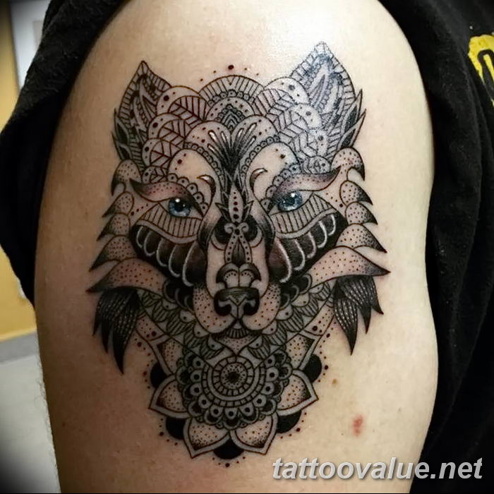 photo of wolf tattoo 27.11.2018 №048 - an example of a finished wolf tattoo - tattoovalue.net