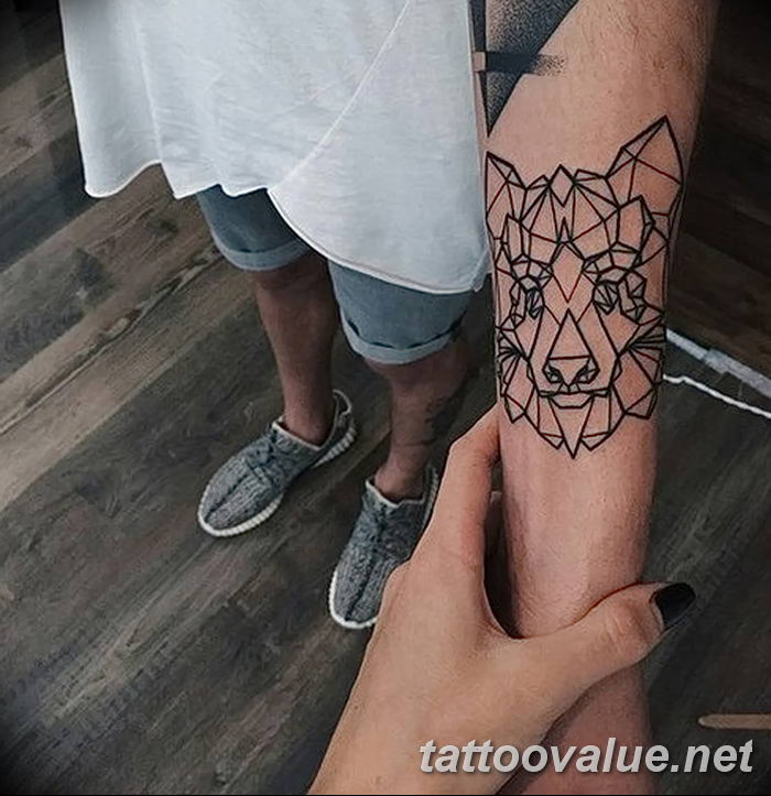 photo of wolf tattoo 27.11.2018 №130 - an example of a finished wolf tattoo - tattoovalue.net