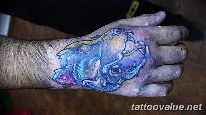 photo of wolf tattoo 27.11.2018 №331 - an example of a finished wolf tattoo - tattoovalue.net