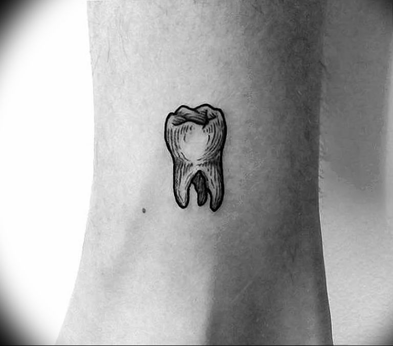 Dental tooth tattoo on wrist | Tooth tattoo, Tattoos, Tattoo designs