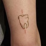 photo tattoo tooth 29.12.2018 №010 - going for a tooth tattoo - tattoovalue.net