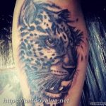 Black and grey realism jaguar tattoo on the forearm. Detailed shading and strong lines create a powerful and dynamic image.