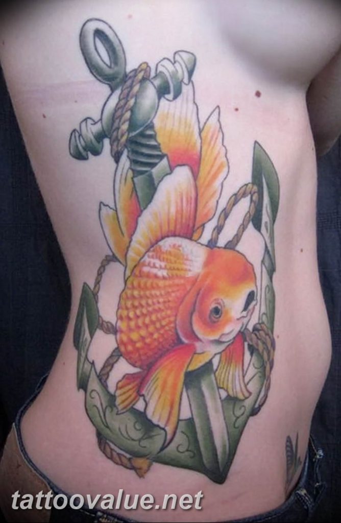gold fish tattoo