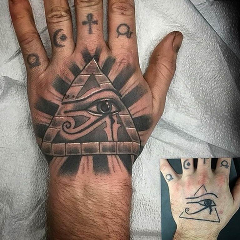 Grey Ink Horus Eye Tattoo On Right Hand