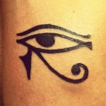 Basic black outline tattoo of the Eye of Horus, a traditional Egyptian symbol, suitable for a small and minimalist tattoo.
