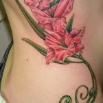 photo tattoo gladiolus 25.01.2019 №056 - drawing a tattoo flower gladiolus - tattoovalue.net