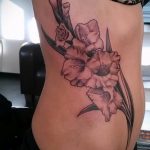 photo tattoo gladiolus 25.01.2019 №029 - drawing a tattoo flower gladiolus - tattoovalue.net