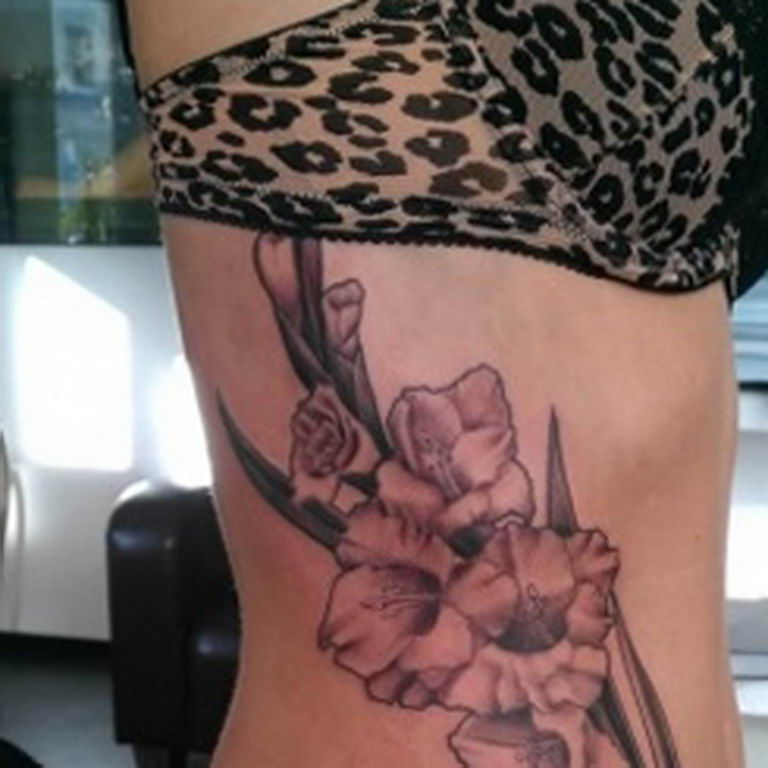 photo tattoo gladiolus 25.01.2019 №066 - drawing a tattoo flower gladiolus - tattoovalue.net