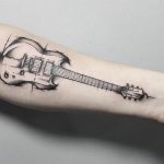 photo tattoo guitar 25.01.2019 №005 - drawing tattoo with a guitar - tattoovalue.net