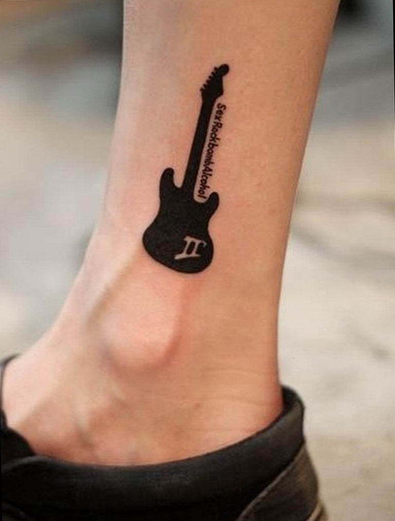 photo tattoo guitar 25.01.2019 №012 - drawing tattoo with a guitar - tattoovalue.net