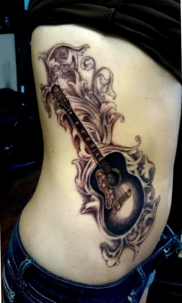 photo tattoo guitar 25.01.2019 №021 - drawing tattoo with a guitar - tattoovalue.net