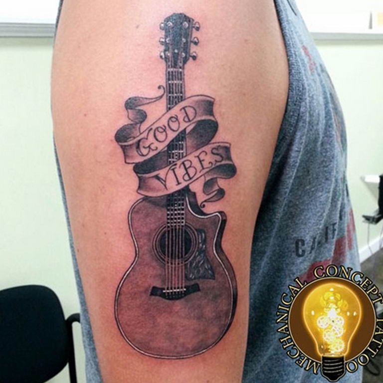 photo tattoo guitar 25.01.2019 №046 - drawing tattoo with a guitar - tattoovalue.net