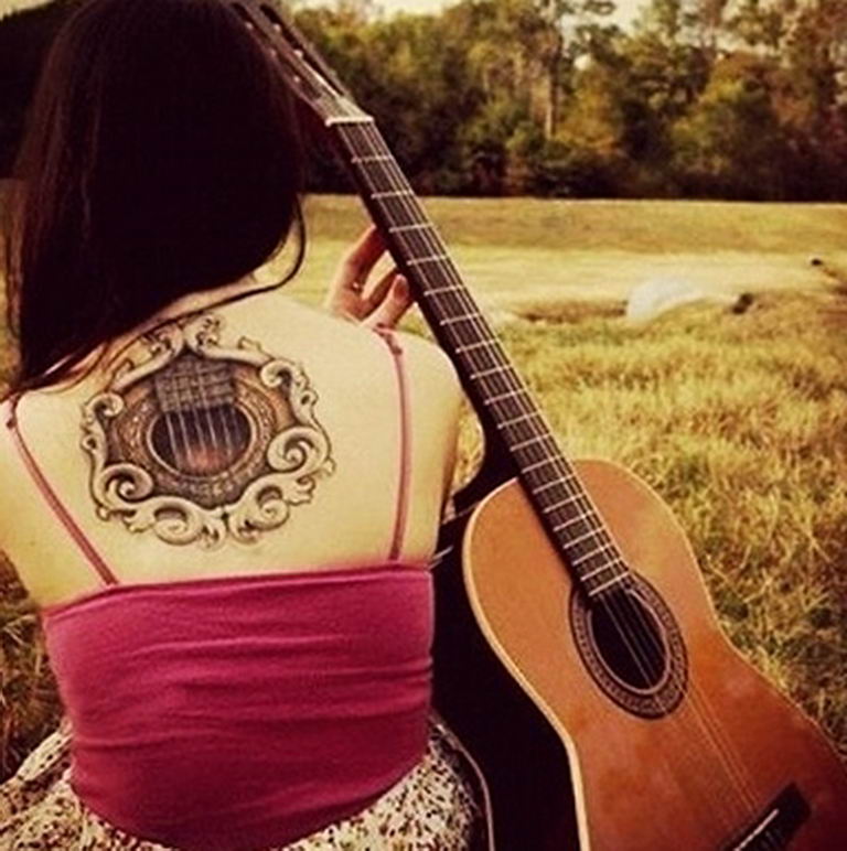 photo tattoo guitar 25.01.2019 №047 - drawing tattoo with a guitar - tattoovalue.net
