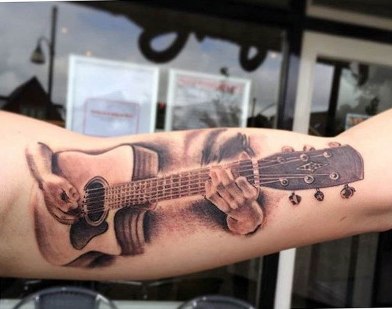 photo tattoo guitar 25.01.2019 №058 - drawing tattoo with a guitar - tattoovalue.net