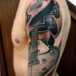 photo tattoo guitar 25.01.2019 №060 - drawing tattoo with a guitar - tattoovalue.net