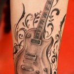 photo tattoo guitar 25.01.2019 №132 - drawing tattoo with a guitar - tattoovalue.net