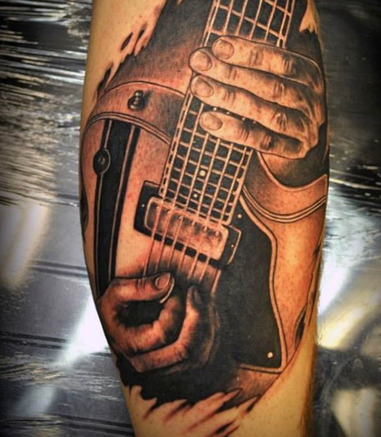 photo tattoo guitar 25.01.2019 №138 - drawing tattoo with a guitar - tattoovalue.net