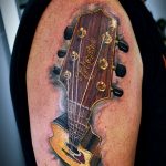 photo tattoo guitar 25.01.2019 №271 - drawing tattoo with a guitar - tattoovalue.net