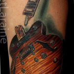 photo tattoo guitar 25.01.2019 №286 - drawing tattoo with a guitar - tattoovalue.net