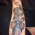 photo tattoo guitar 25.01.2019 №301 - drawing tattoo with a guitar - tattoovalue.net