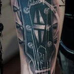 photo tattoo guitar 25.01.2019 №314 - drawing tattoo with a guitar - tattoovalue.net