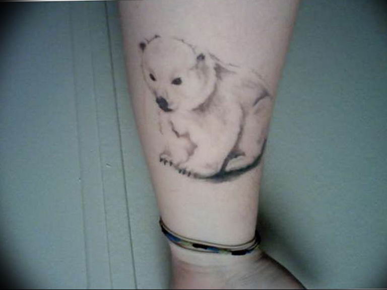 Cute bear shape tattoo on ankle idea for woman  Bear tattoo designs Bear  tattoos Black bear tattoo