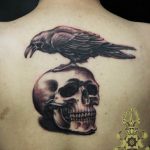 photo tattoo raven on the skull 18.02.2019 №028 - tattoo with skull and raven - tattoovalue.net