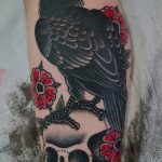 photo tattoo raven on the skull 18.02.2019 №054 - tattoo with skull and raven - tattoovalue.net