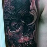 photo tattoo raven on the skull 18.02.2019 №074 - tattoo with skull and raven - tattoovalue.net