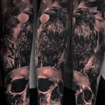 photo tattoo raven on the skull 18.02.2019 №075 - tattoo with skull and raven - tattoovalue.net