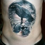 photo tattoo raven on the skull 18.02.2019 №105 - tattoo with skull and raven - tattoovalue.net