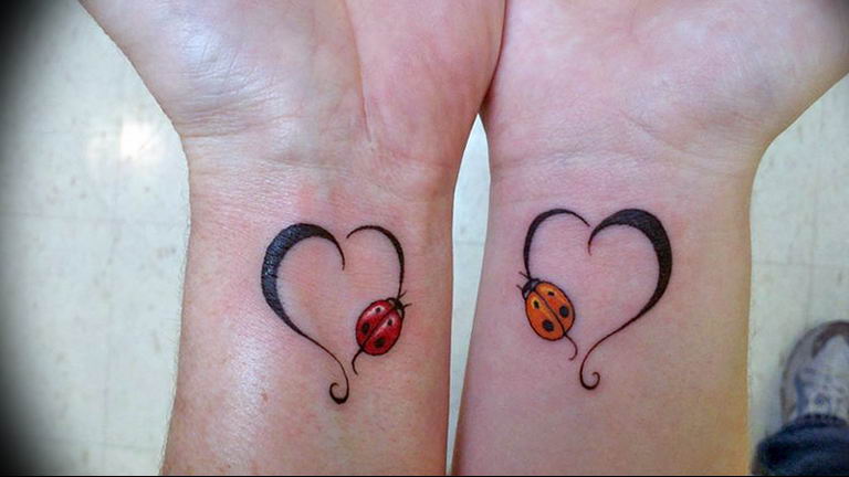 Little ladybug tattoo on the wrist