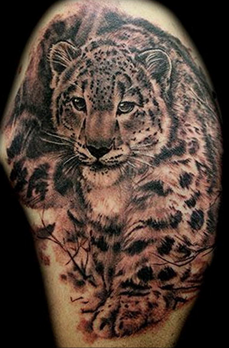 snow leopard tattoo arm