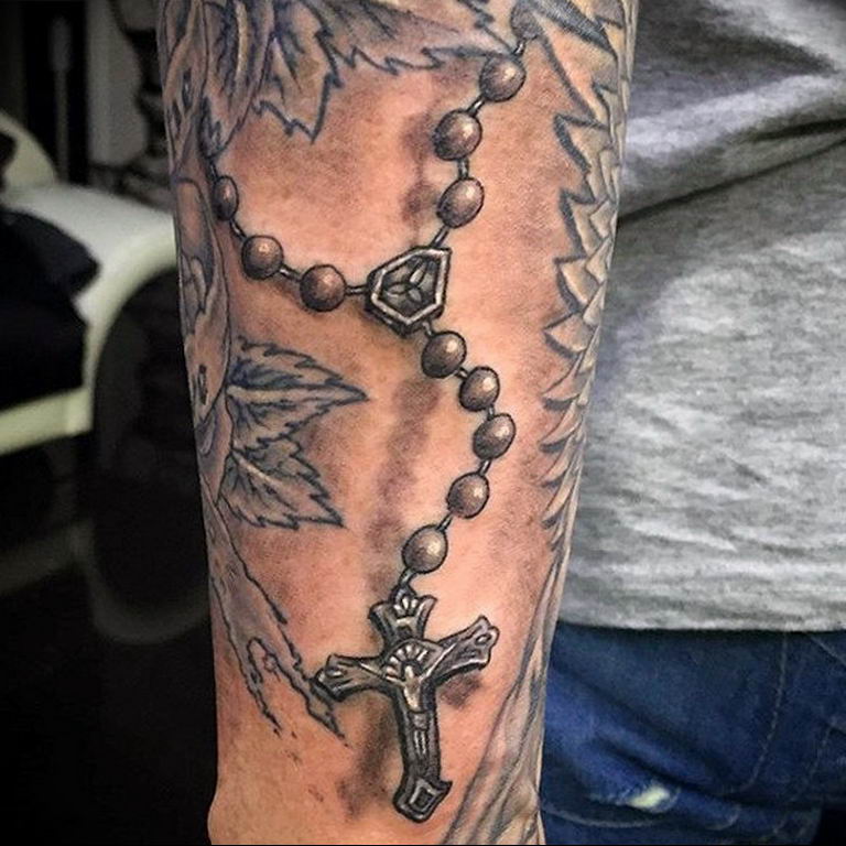 rosary on neck tattooTikTok Search
