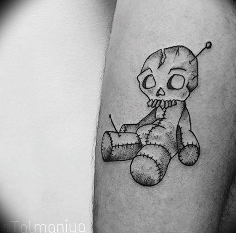 Voodoo Doll Tattoo Meaning: history of the picture, photo examples, sketches