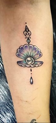 The Meaning of the Pearl Tattoo: features of the picture, photo