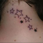 Small black outline stars tattoo on the back of the neck, minimalist style, delicate ink ideas, subtle placement.
