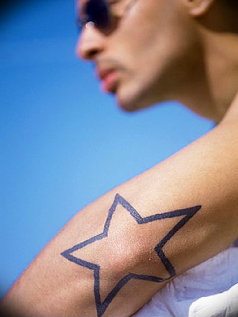 Photo tattoo star on the elbow  №049 - star tattoo example -   