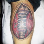 Photo biomechanics on the calf tattoo 30.07.2019 №021 - biomechanics tattoo - tattoovalue.net