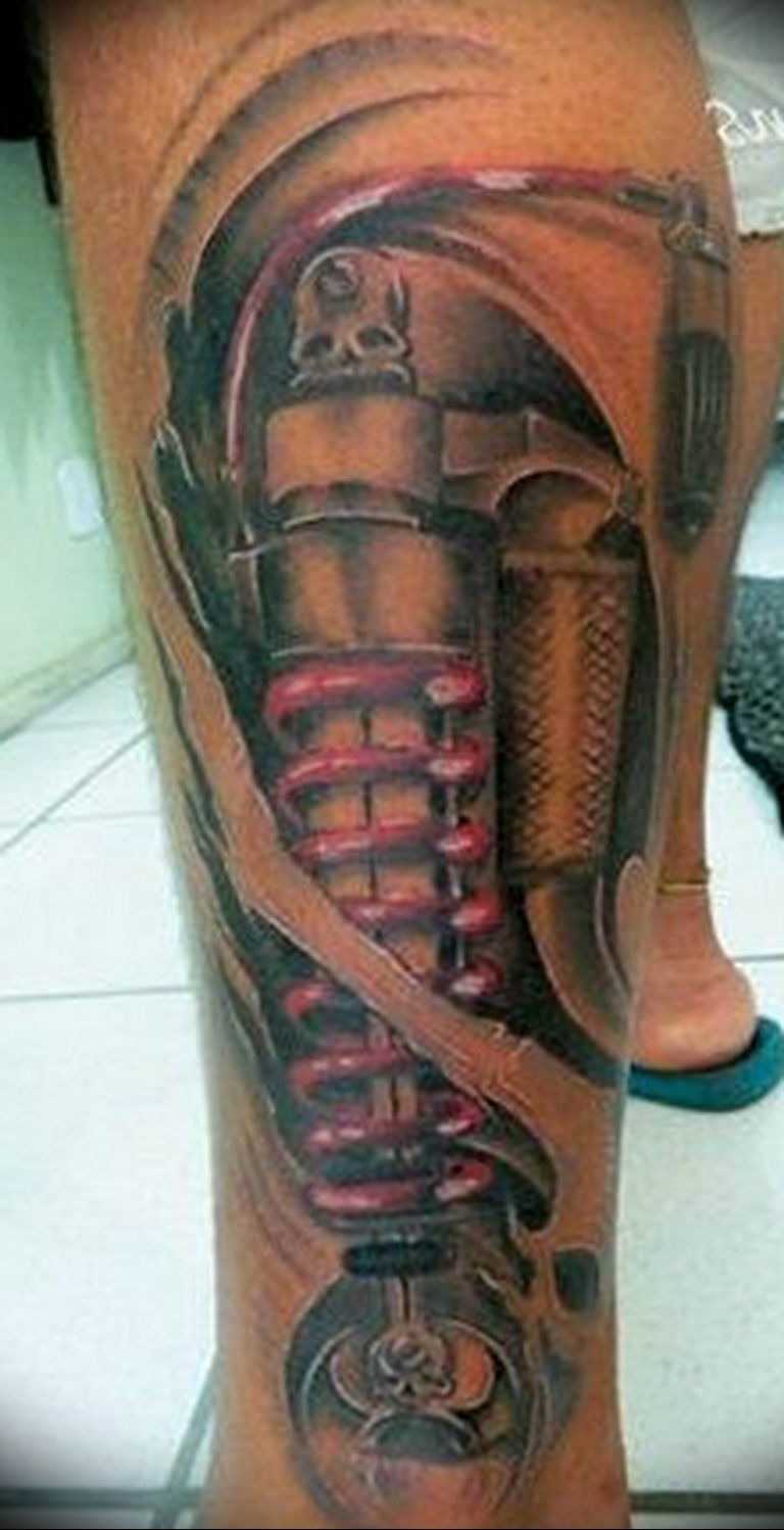 Photo biomechanics on the calf tattoo 30.07.2019 №025 - biomechanics tattoo - tattoovalue.net