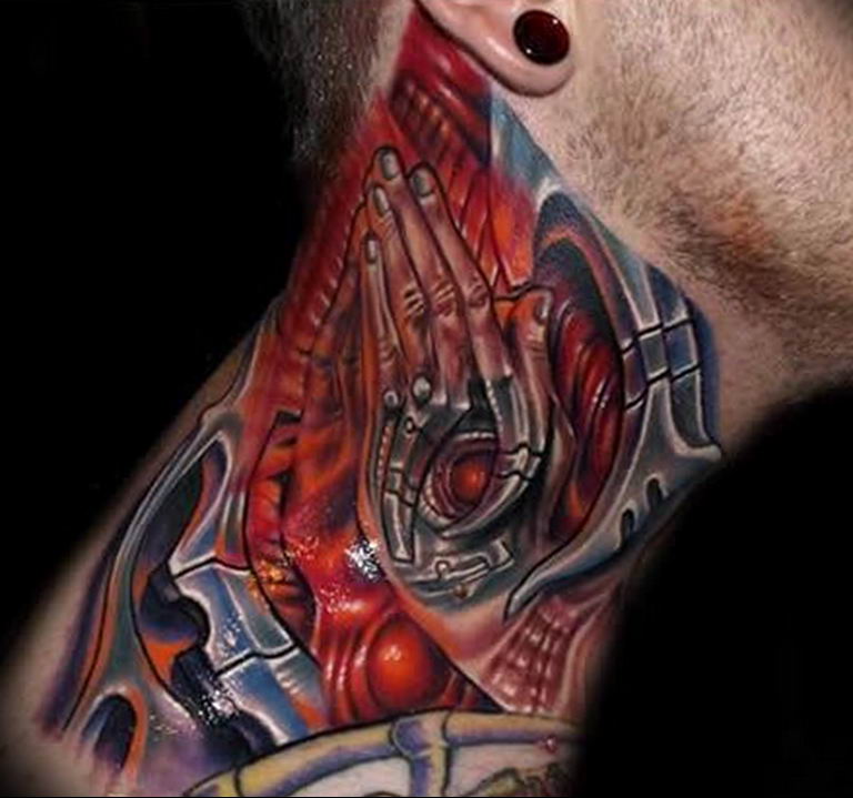 Photo tattoo on the neck of biomecha 30.07.2019 №002 - biomechanics tattoo - tattoovalue.net