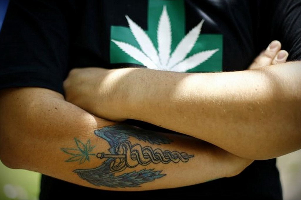 tattoo on the arm of marijuana 30.09.2019 №021 -hemp (MARIJUANA) tattoo- tattoovalue.net