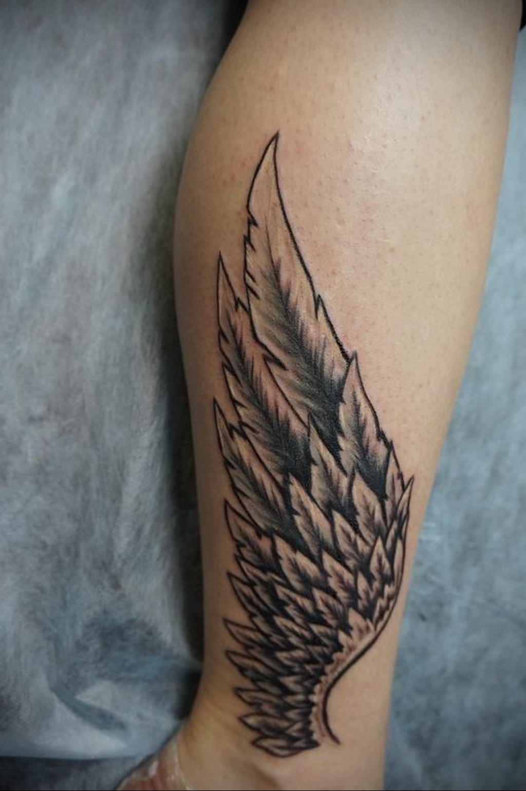 Photo example drawing of a tattoo with Hermes wings 07.10.2019 №094 -tattoo- tattoovalue.net