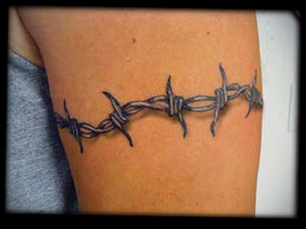 Barbed wire tattoo meaning. 