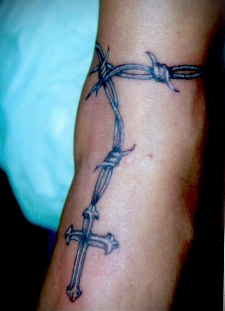 Barbed wire line tattoo inked on the left forearm  Barbed wire tattoos  Tattoos Line tattoos